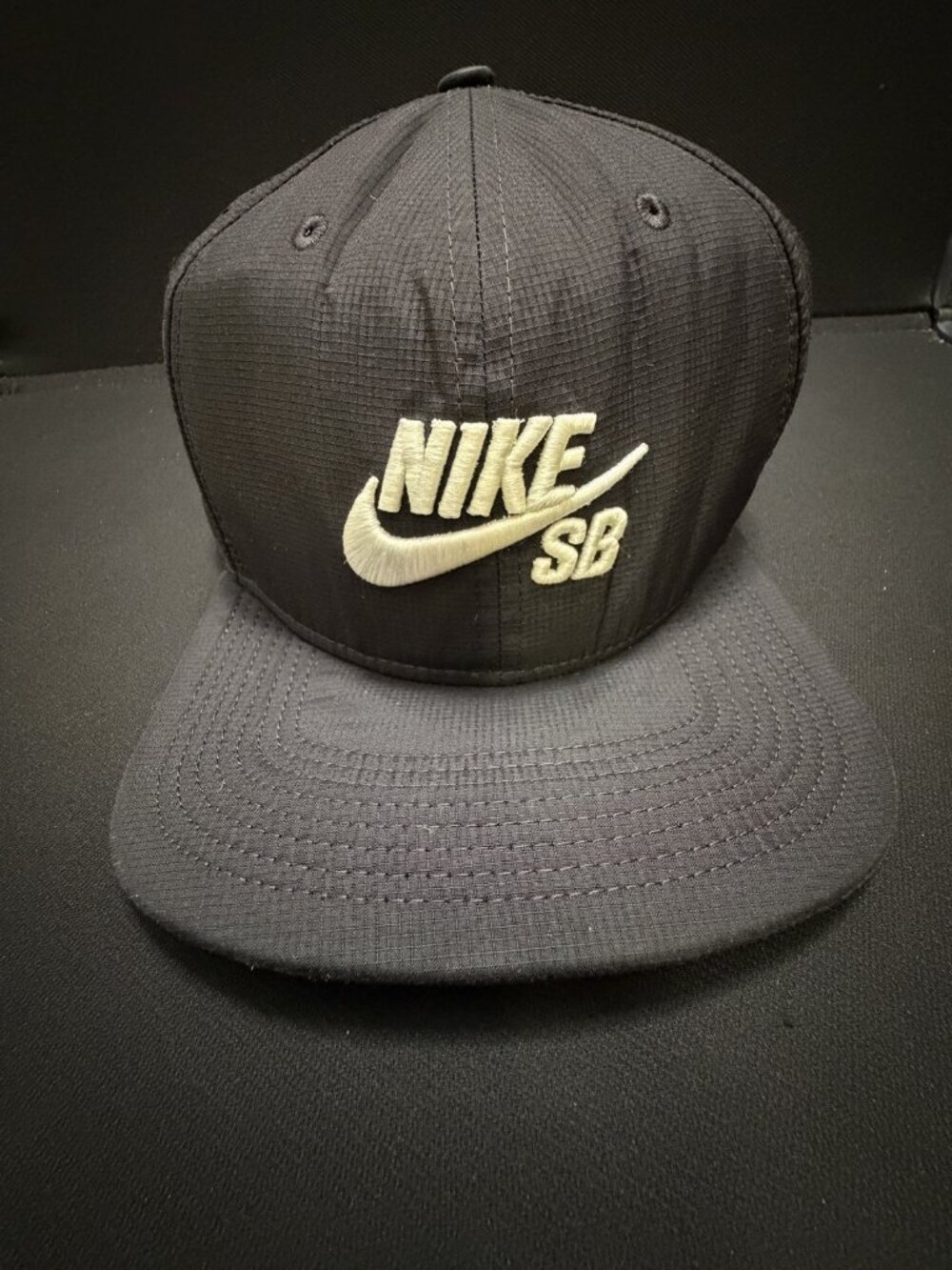 Nike SB Black Snapback Hat White Embroidered Logo Mesh Panels